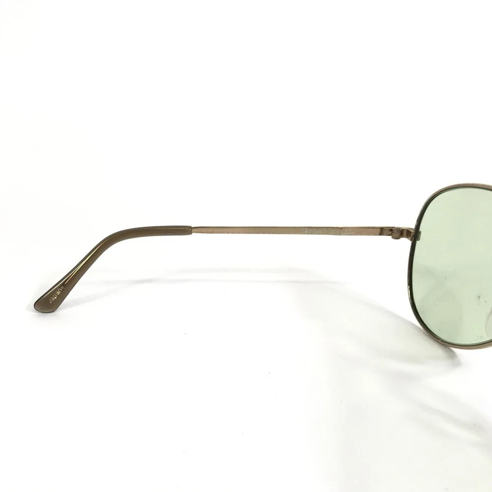 Vintage Serengeti Sunglasses 6055M Mens Gold Green Aviator Simba Photochromic